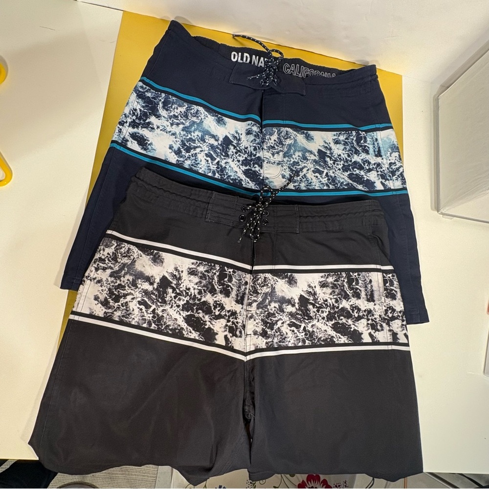 Old Navy set of two men’s swim trunks, size 34 waist, Navy/White & black/white.